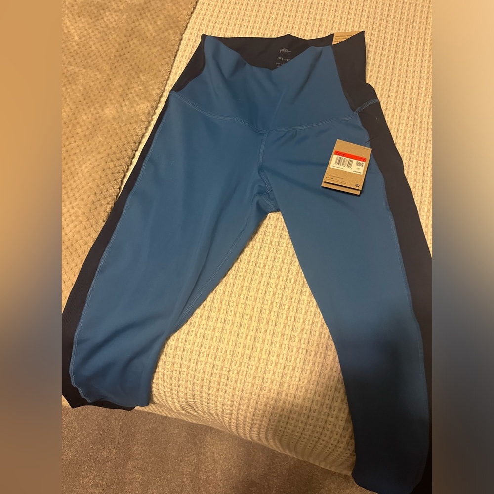 Women’s Nike Yoga Tights; size L